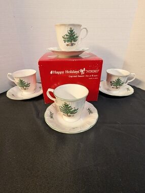 New In Box Happy Holidays Christmas time by Nikko Cups and Saucers Set of Four